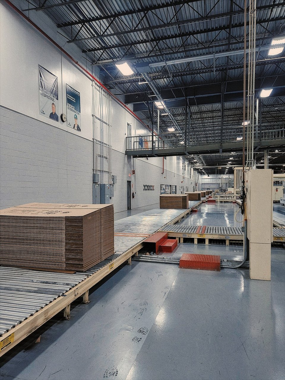 Corrugated board sheets moving on a conveyor