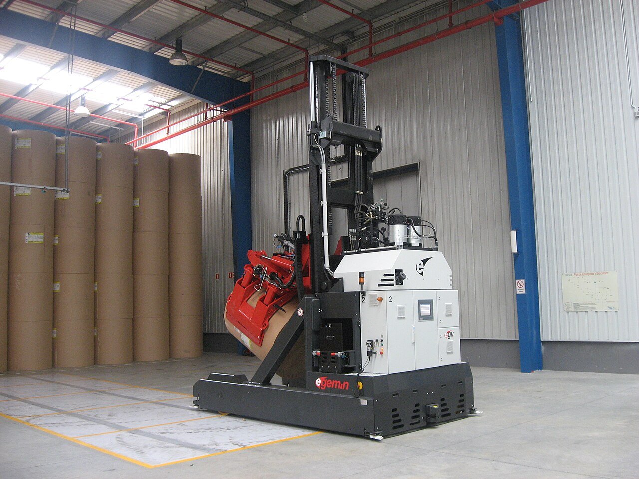 Generic paper-roll handling scene, not equipment at Ajin P&P