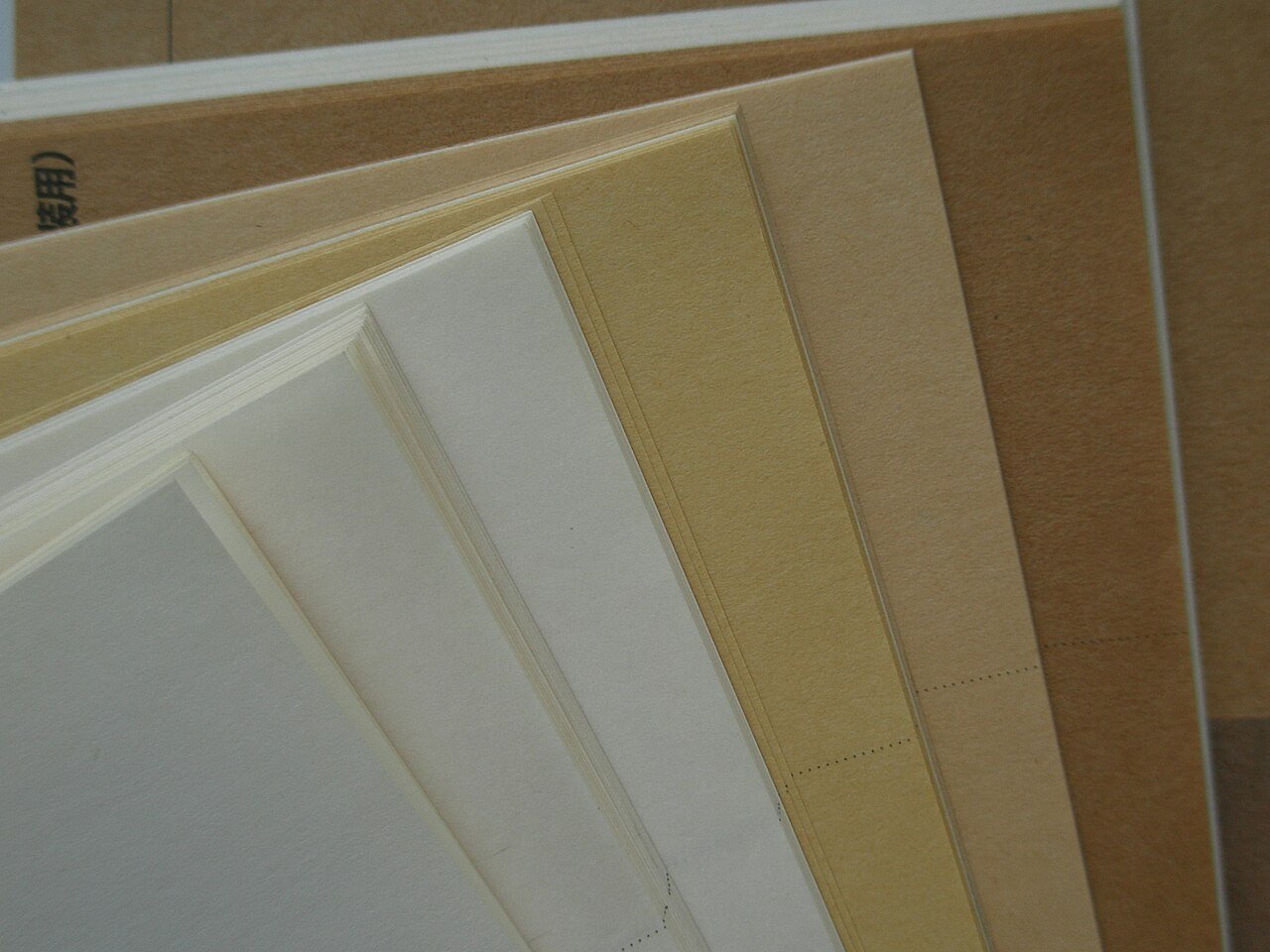 Packaging paper sheets in shades from white to brown