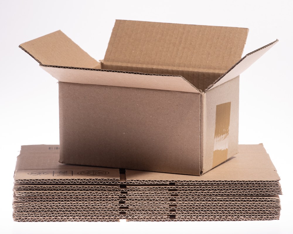 Open generic corrugated carton on flat board stock; not KKPK’s 2026 output or shipment evidence